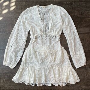 White eyelet v-neck long-sleeve open-waist mini-dress with short ruffle bottom